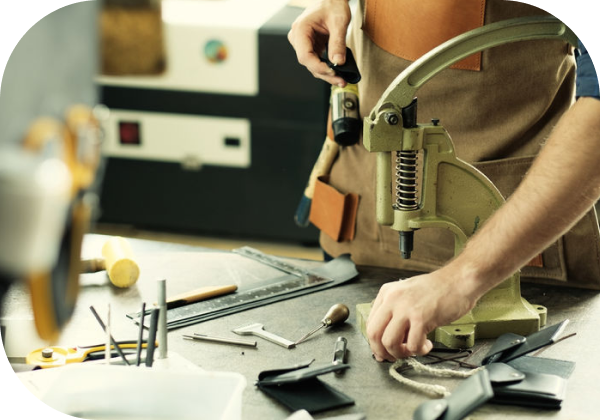 Close up of carpenter working with tools