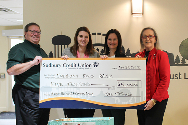 SCU staff presenting a donation to the Sudbury Food Bank
