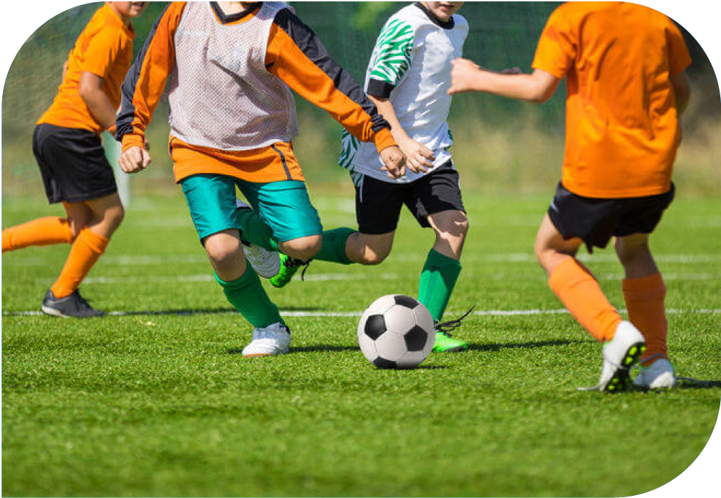 Youth playing soccer