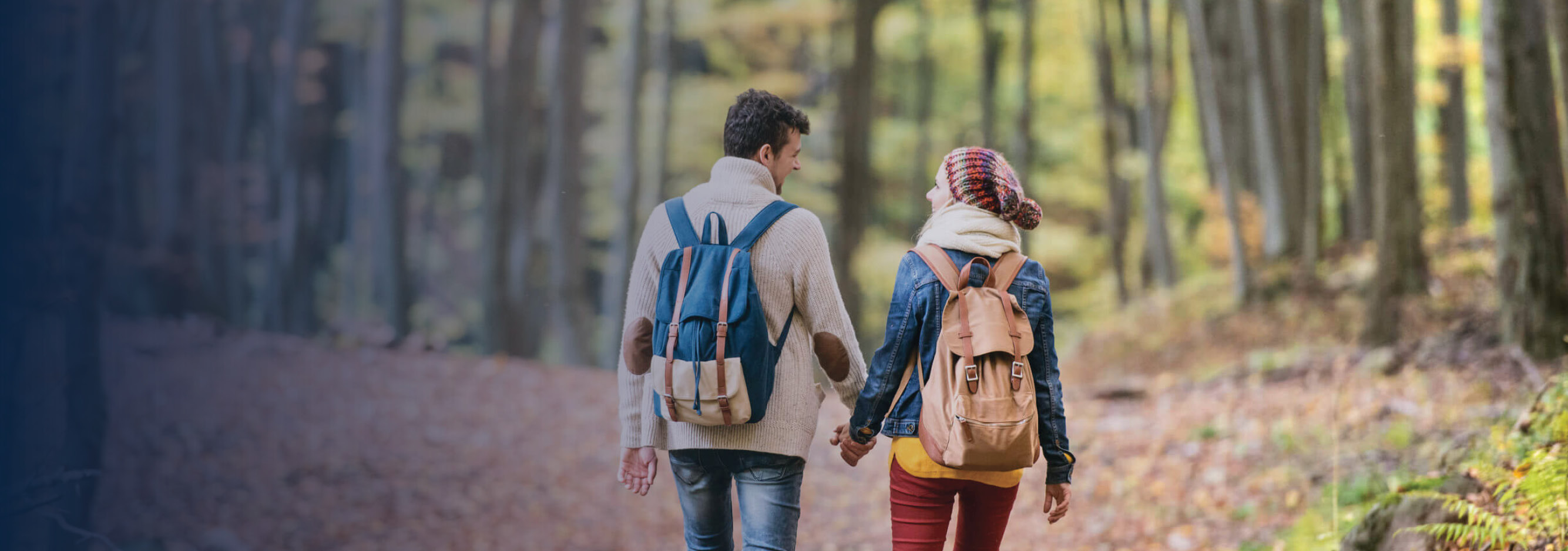 Couple hiking through forest