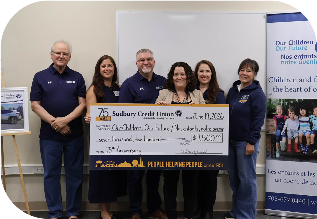 SCU staff present a cheque for $7,500 to Our Children, Our Future