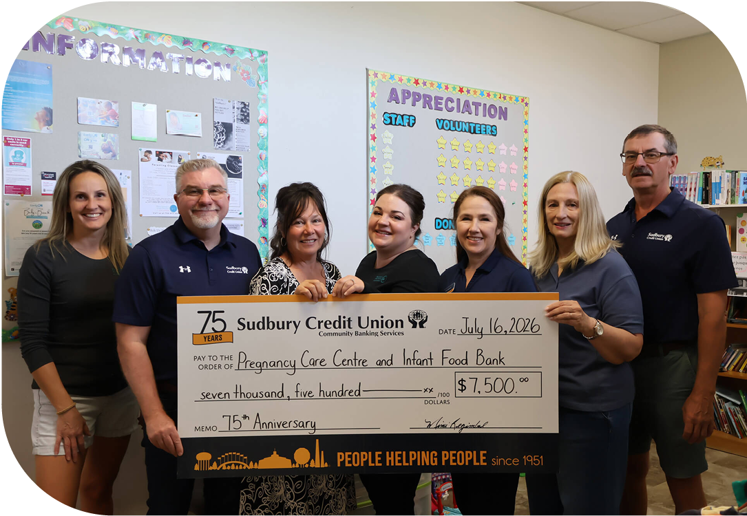 SCU staff present a cheque for $7,500 to Pregnancy Care Centre