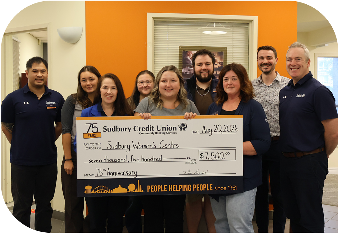 SCU staff present a cheque for $7,500 to the Sudbury Women's Centre