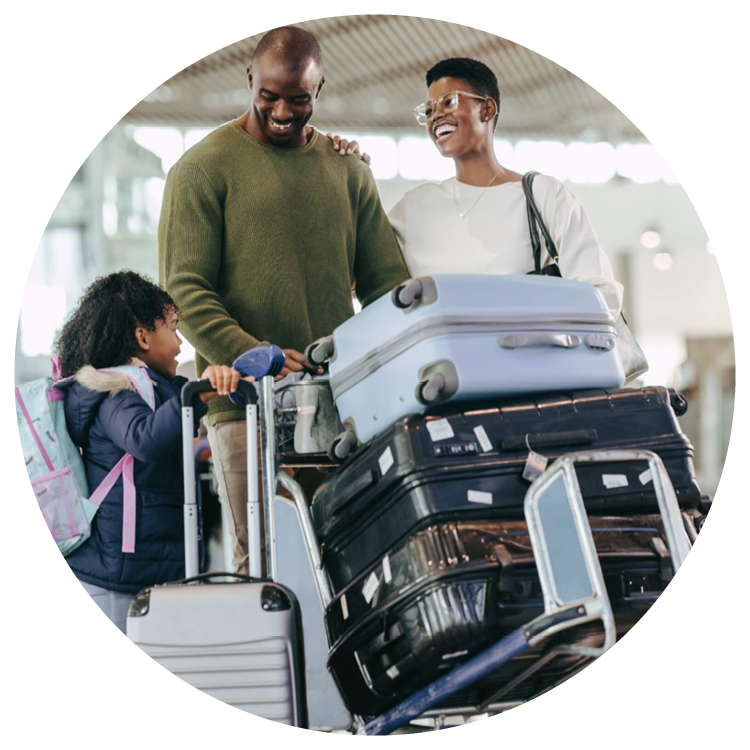 A family at the airport with luggage. 