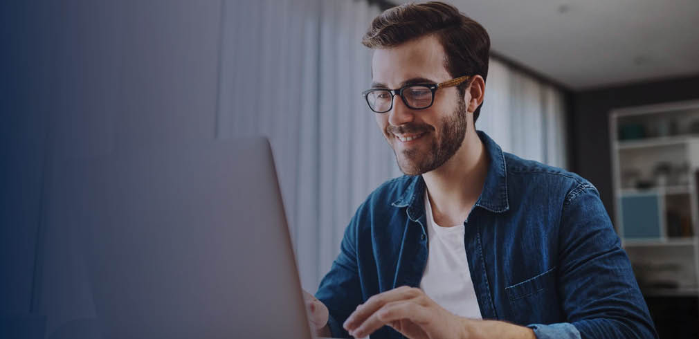 Man sitting at laptop