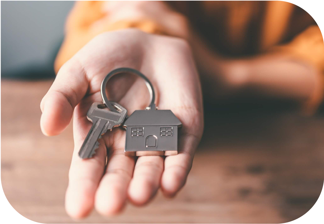 Close up of hand holding a set of house keys