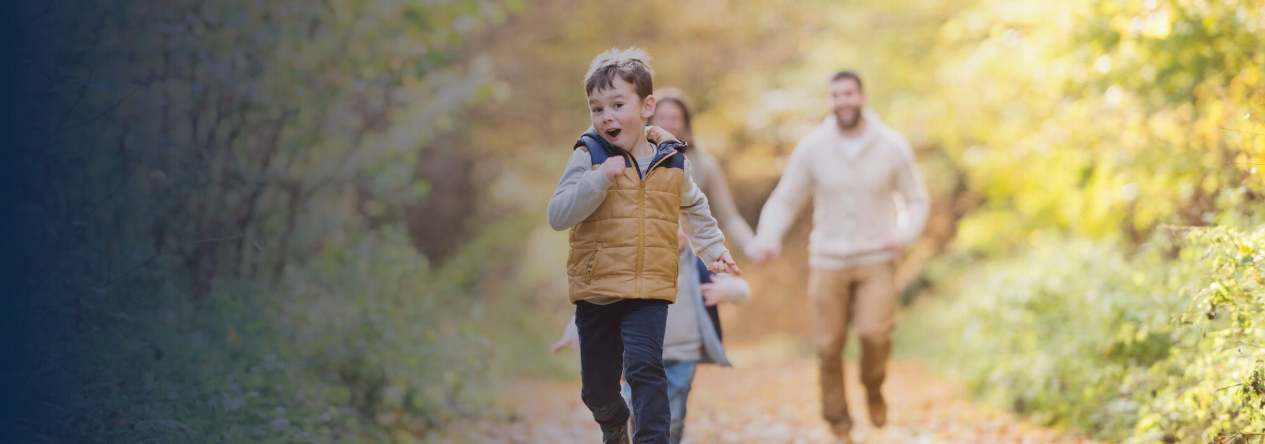 Young family on a walk in forest