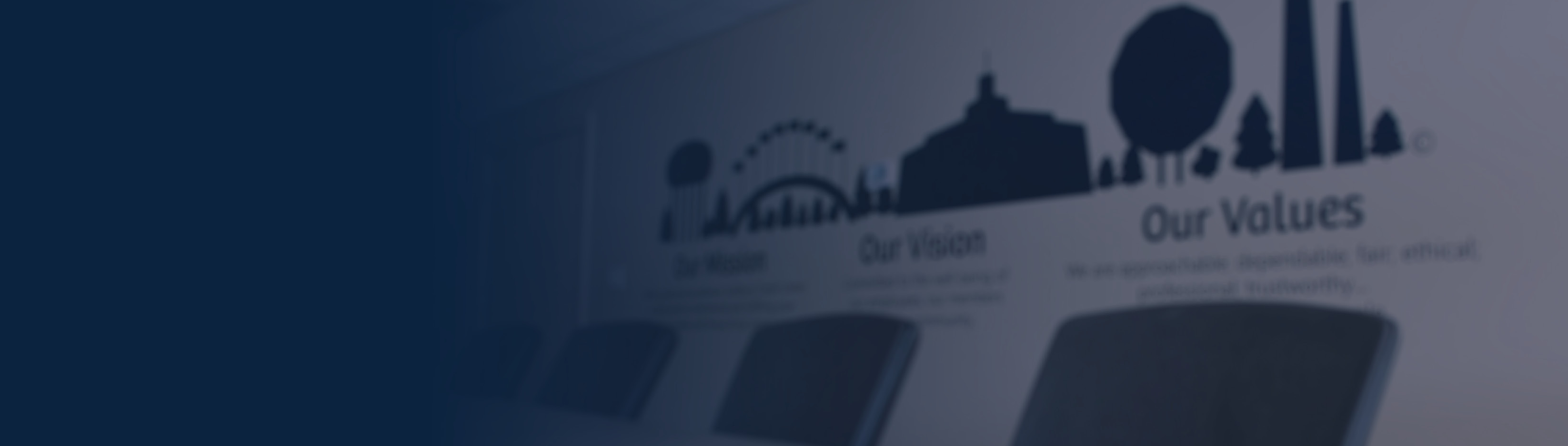 People gathered at board table