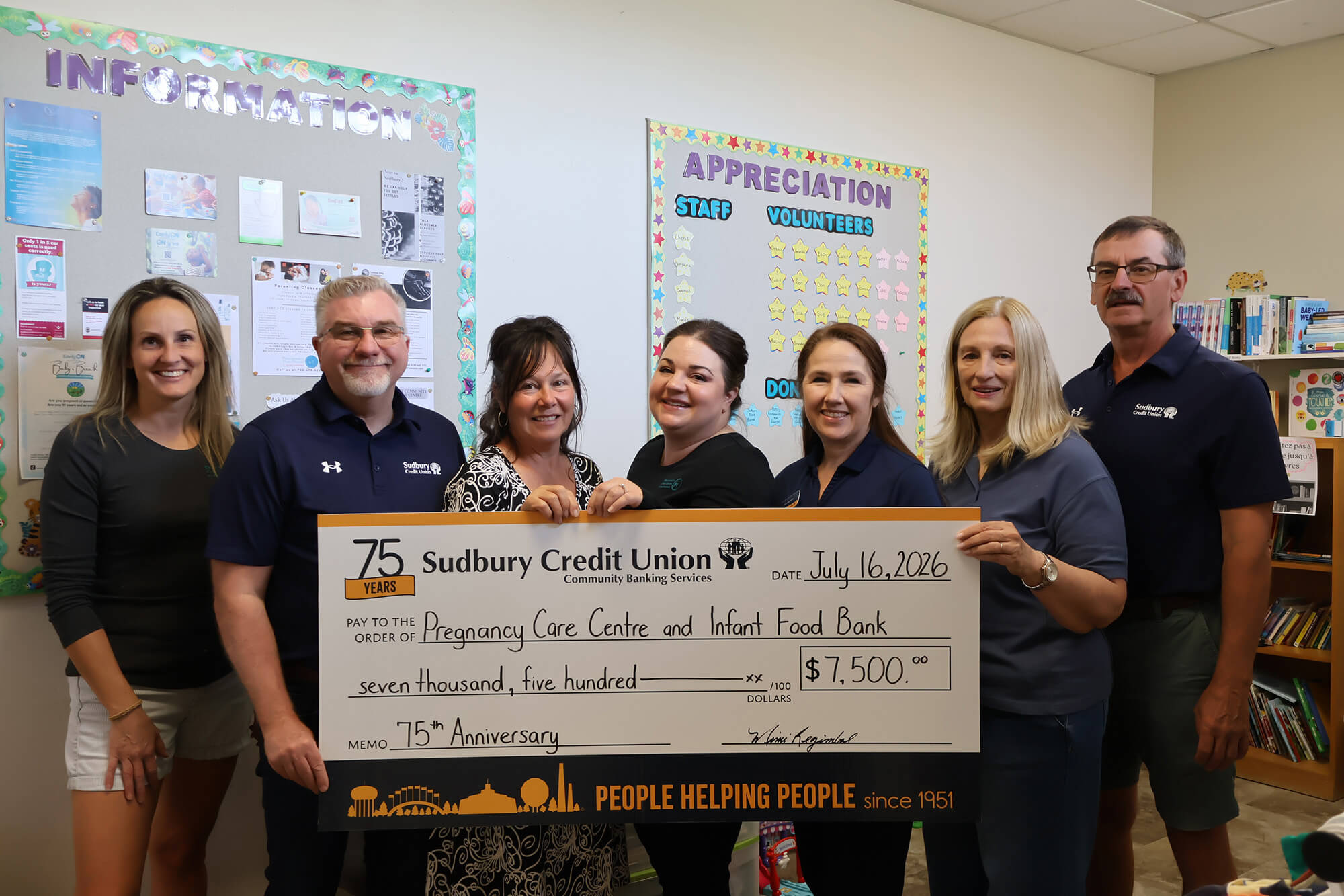 SCU staff present a cheque for $7,500 to the Pregnancy Care Centre