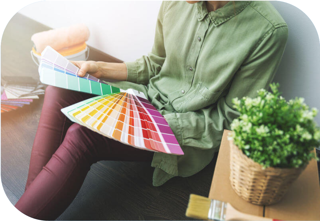 Close up of a person looking at paint chips