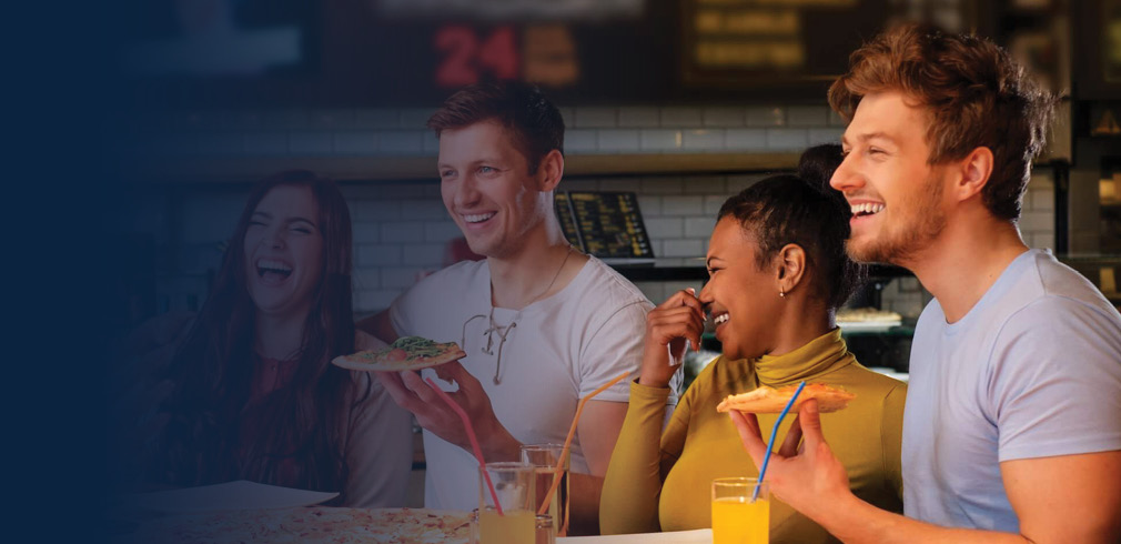 Friends enjoying pizza together