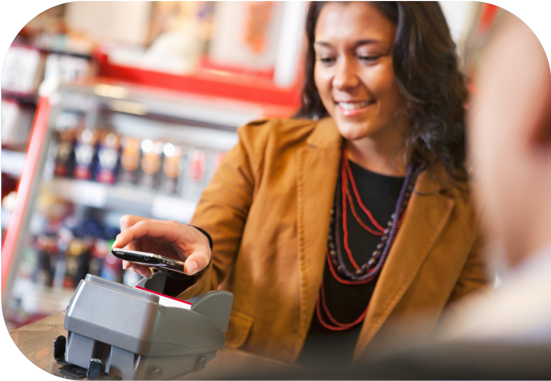 Woman paying for a purchase using mobile wallet.