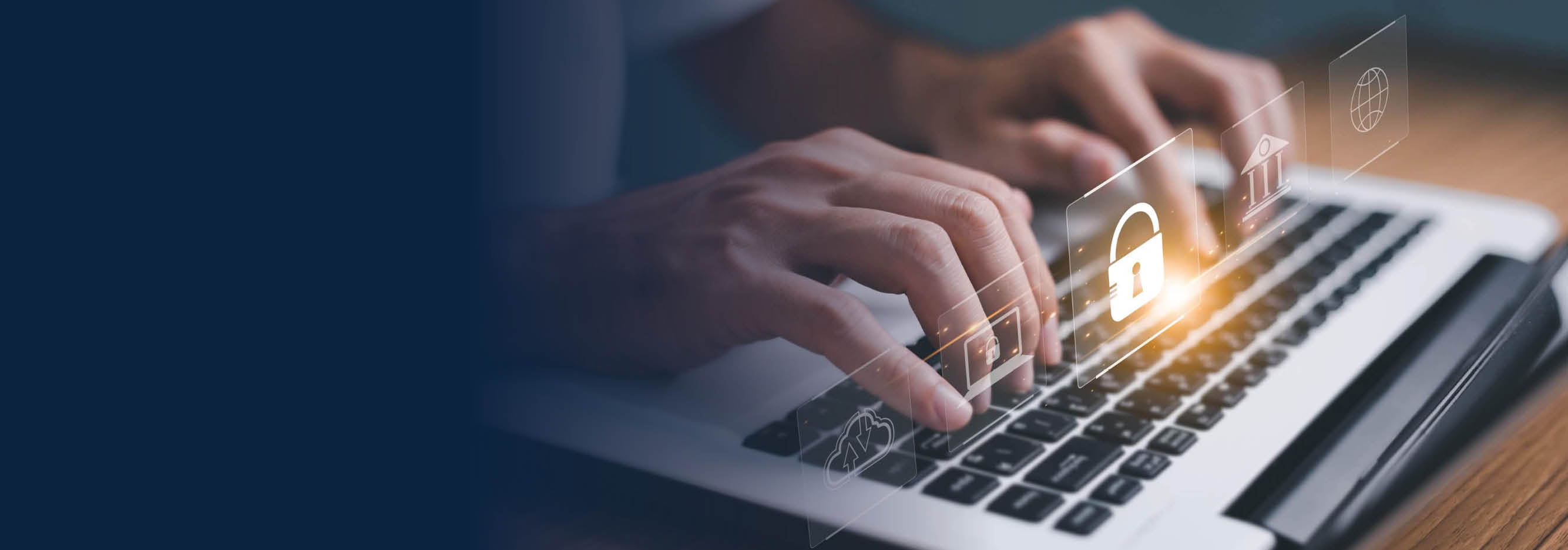 Hands on laptop keyboard.