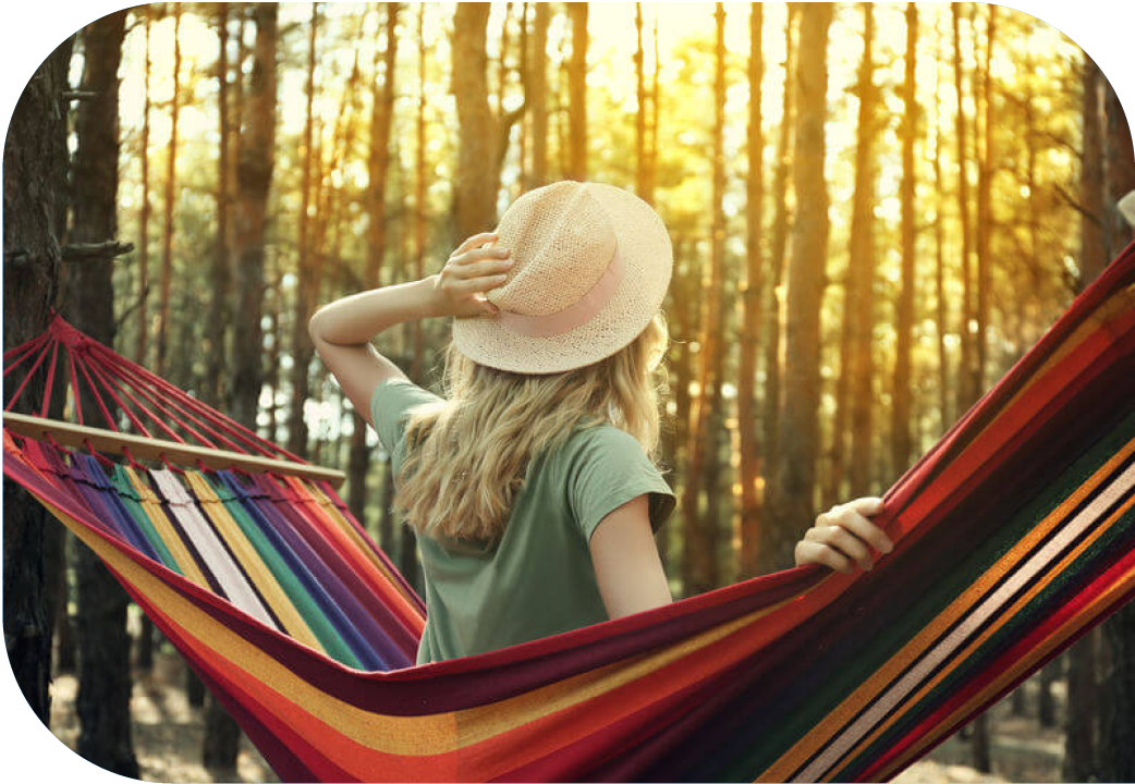 Woman sitting in hammock