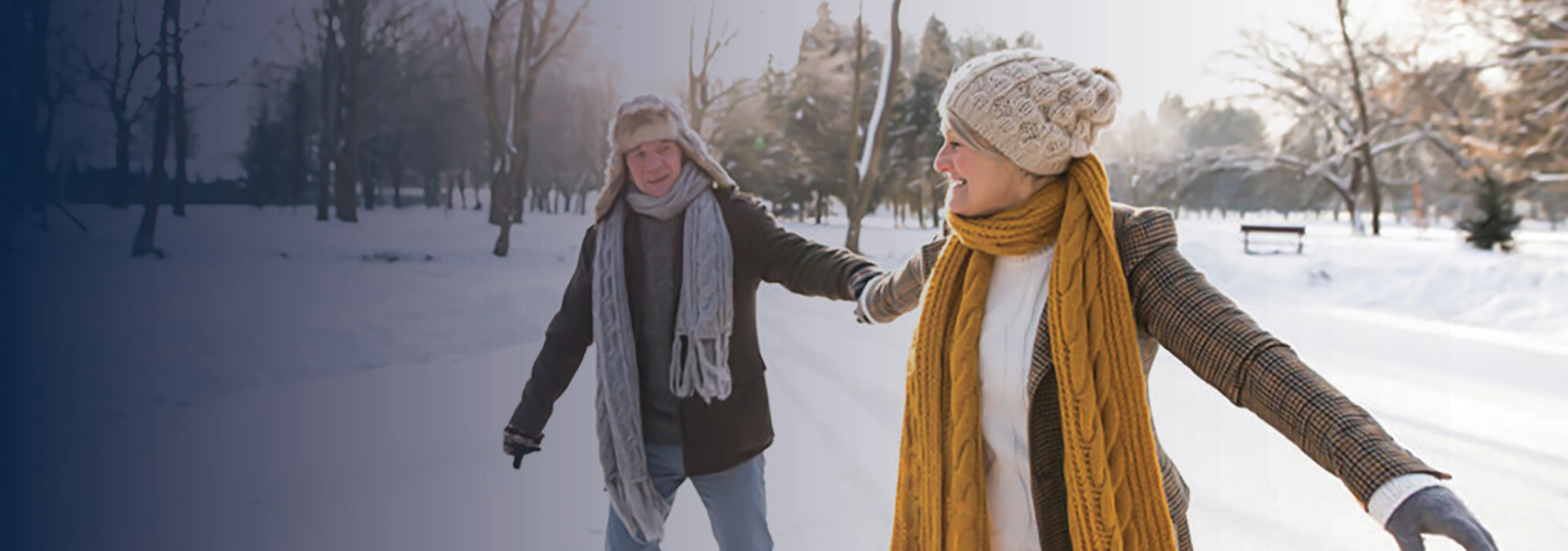 Retired couple holding hands while ice skating