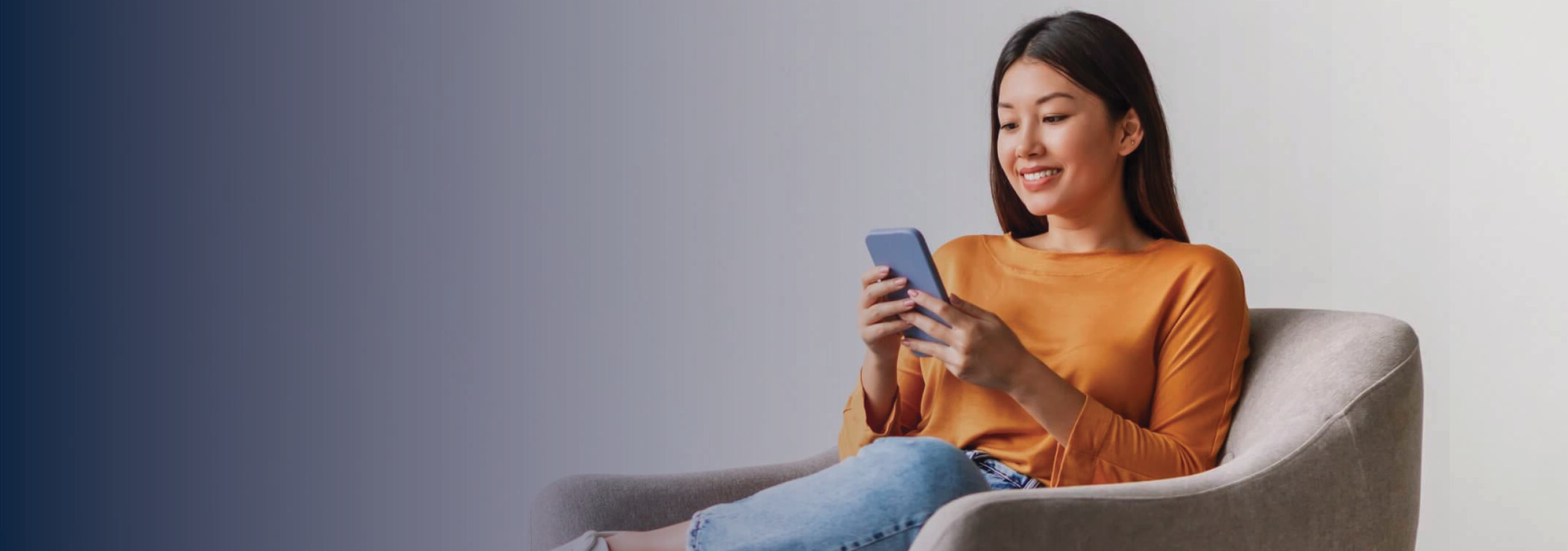 Woman on phone while working at a computer