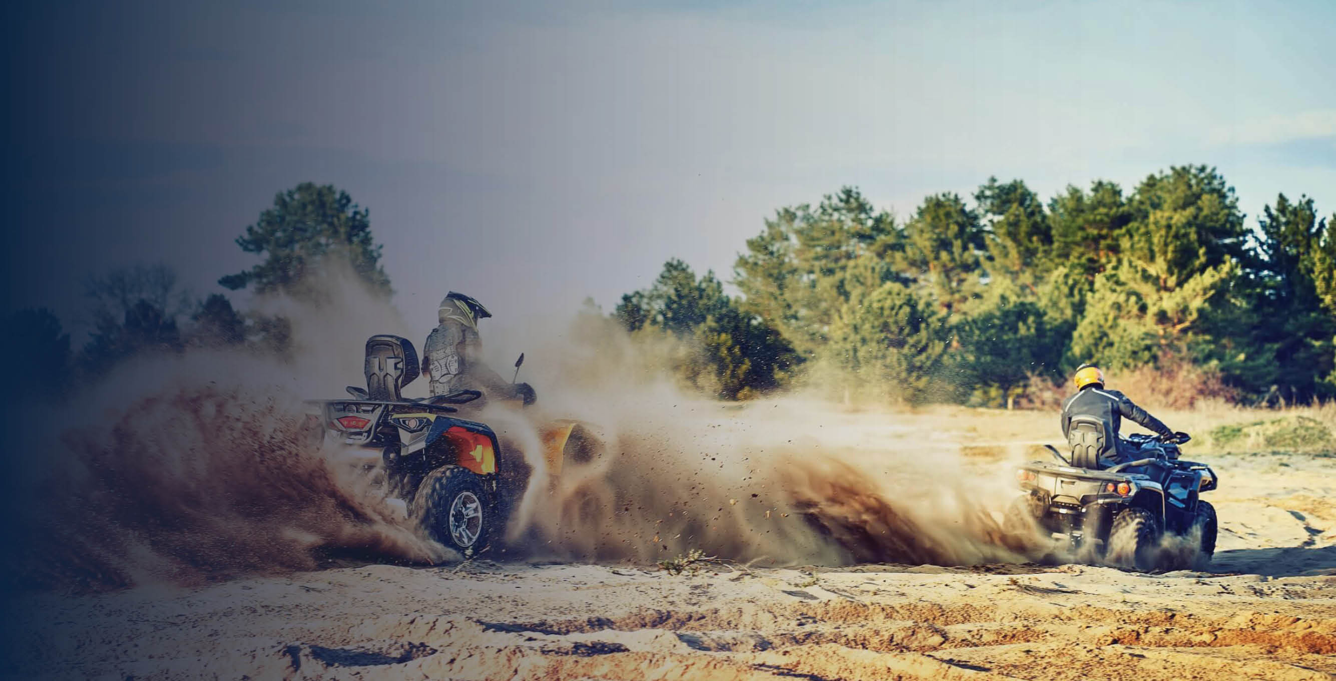 ATVs driving through mud